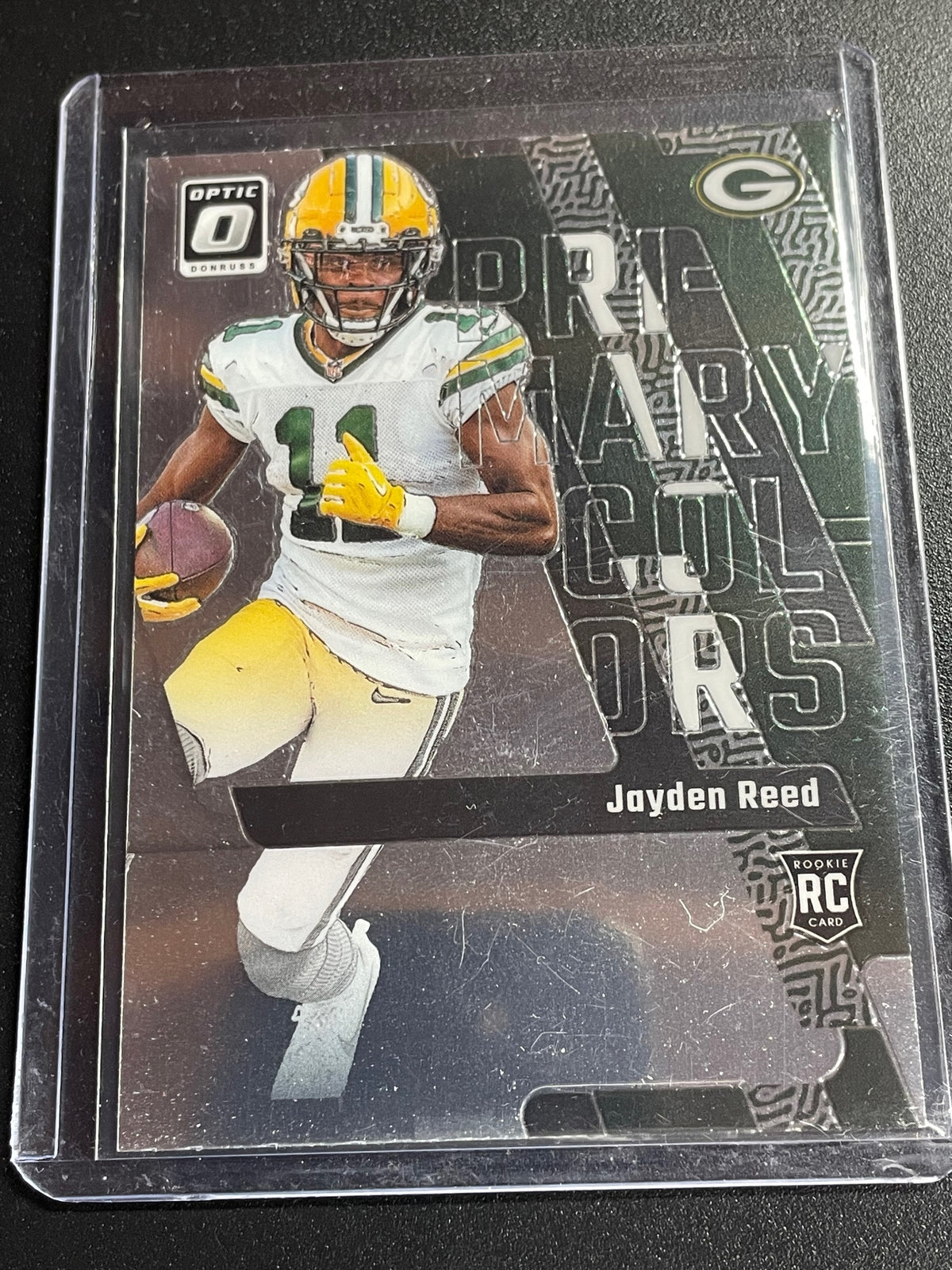 2023 Donruss Optic #12 Jayden Reed Primary Colors